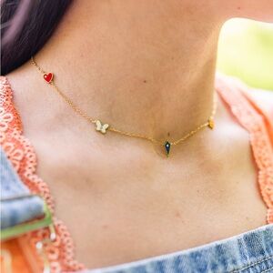 AMD Gold Necklace with Red Heart, White Butterfly & Blue Charm